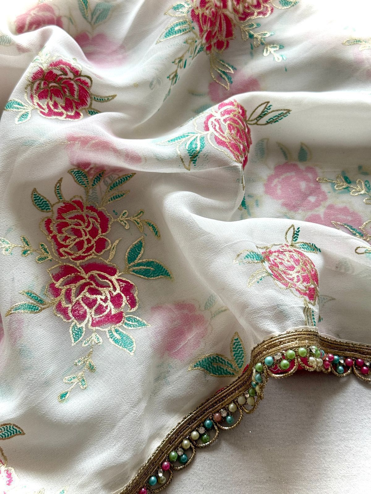 Elegant Georgette Printed Saree with Fancy Pearl Border & Satin Blouse