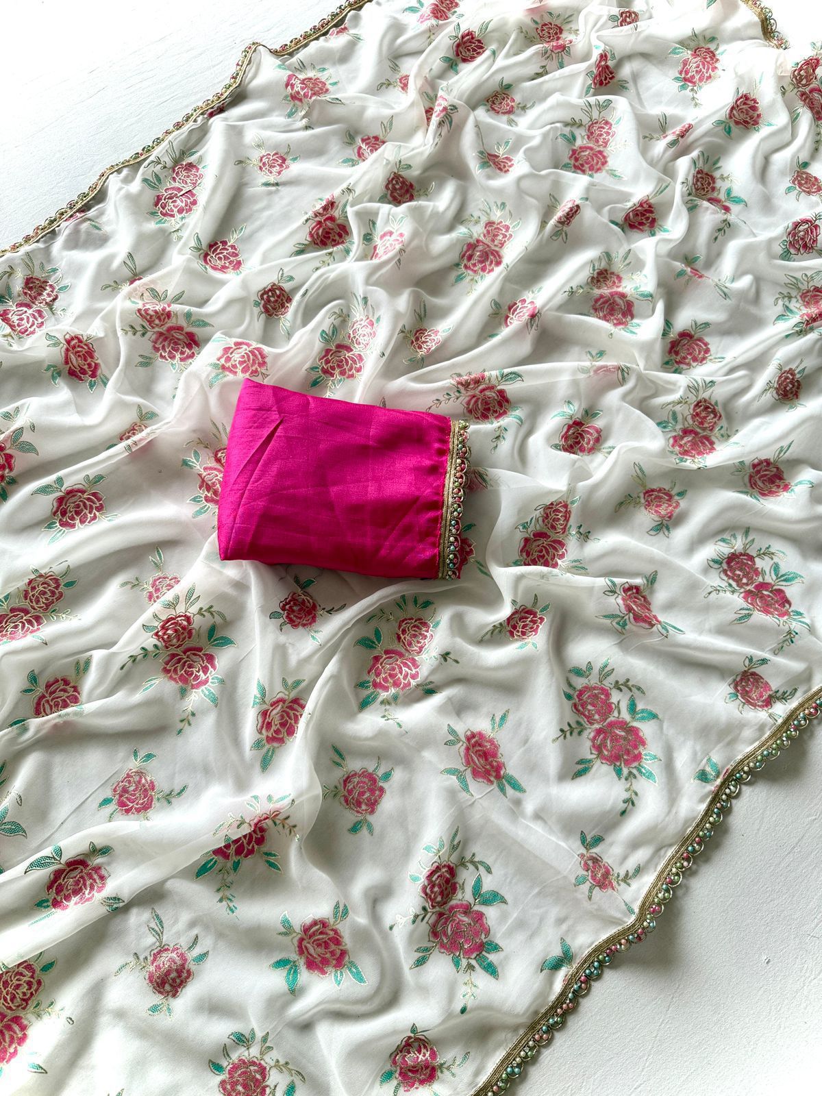 Elegant Georgette Printed Saree with Fancy Pearl Border & Satin Blouse